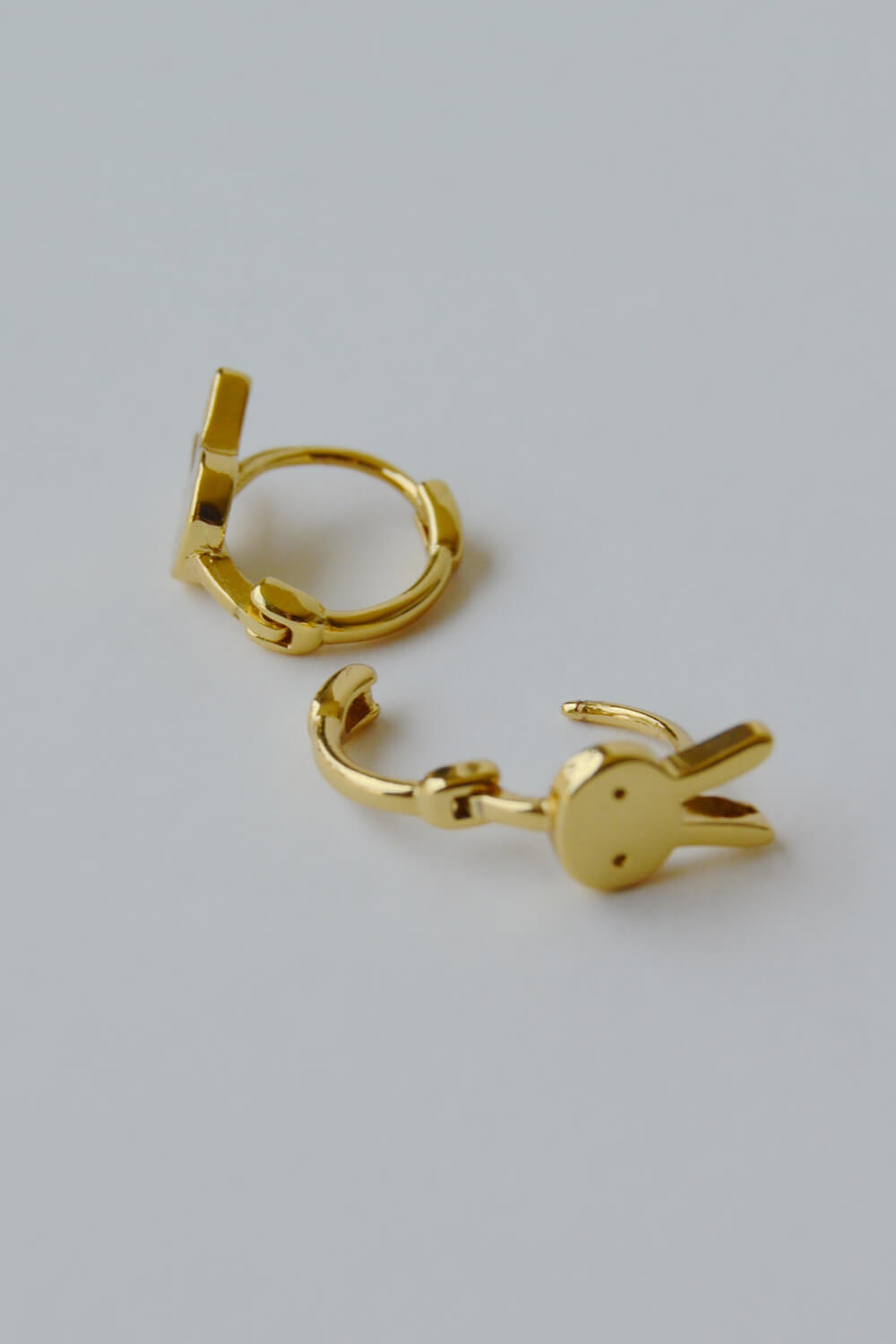 bunny huggie earrings - gold